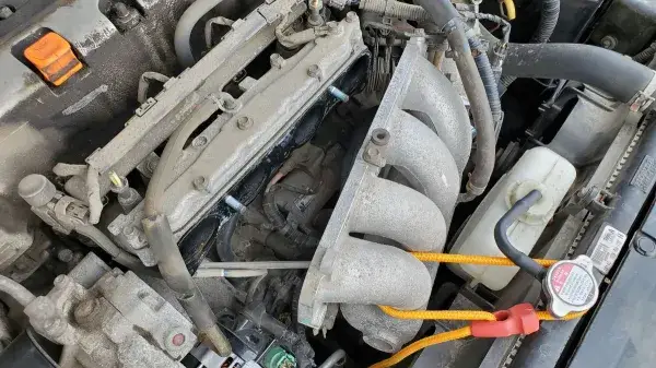 Where is the starter located in Honda Accord
